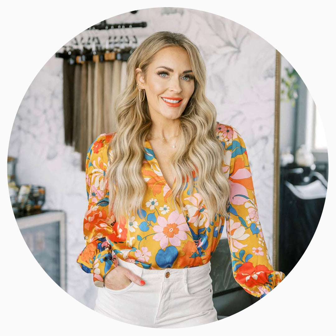 Vera Hair Co Pro Partner Em Baily standing in salon with long, blended micro-tied extensions