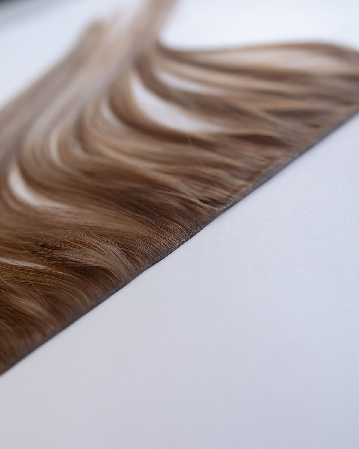 Weft Hair Extensions: A Professional Guide to Hand-Tied, Genius and Beaded Wefts